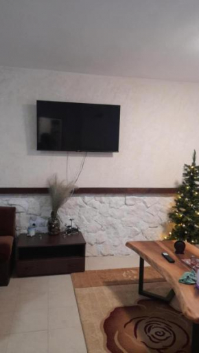 Holiday home with indoor fireplace